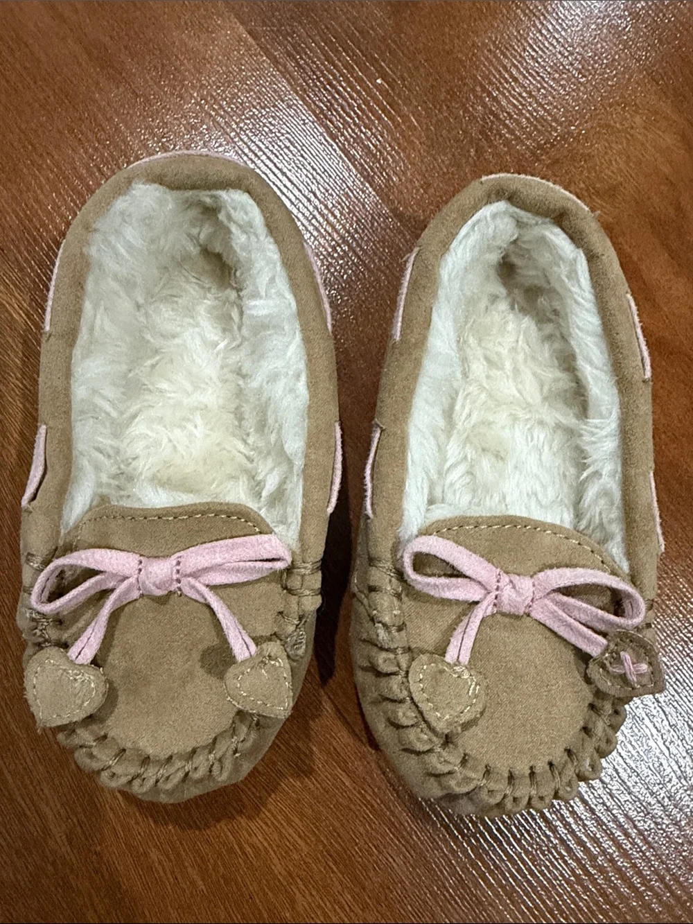 Cozy Suede Moccasin Slippers in Light Brown with Pink Bow